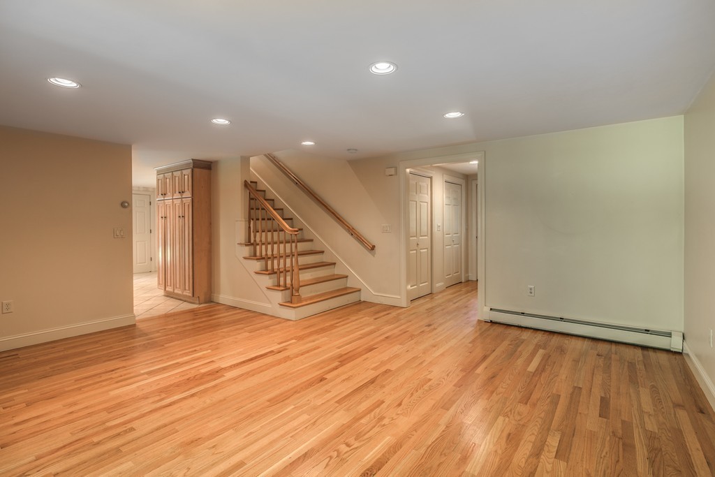 living room with stairs to the second floor