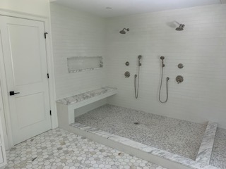 big white bathroom showers